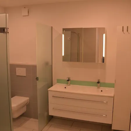 Modern Retreat: Cinema Experience With Private Parking